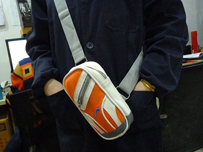 特价处理贵人鸟斜挎包PU腰包 旅行包